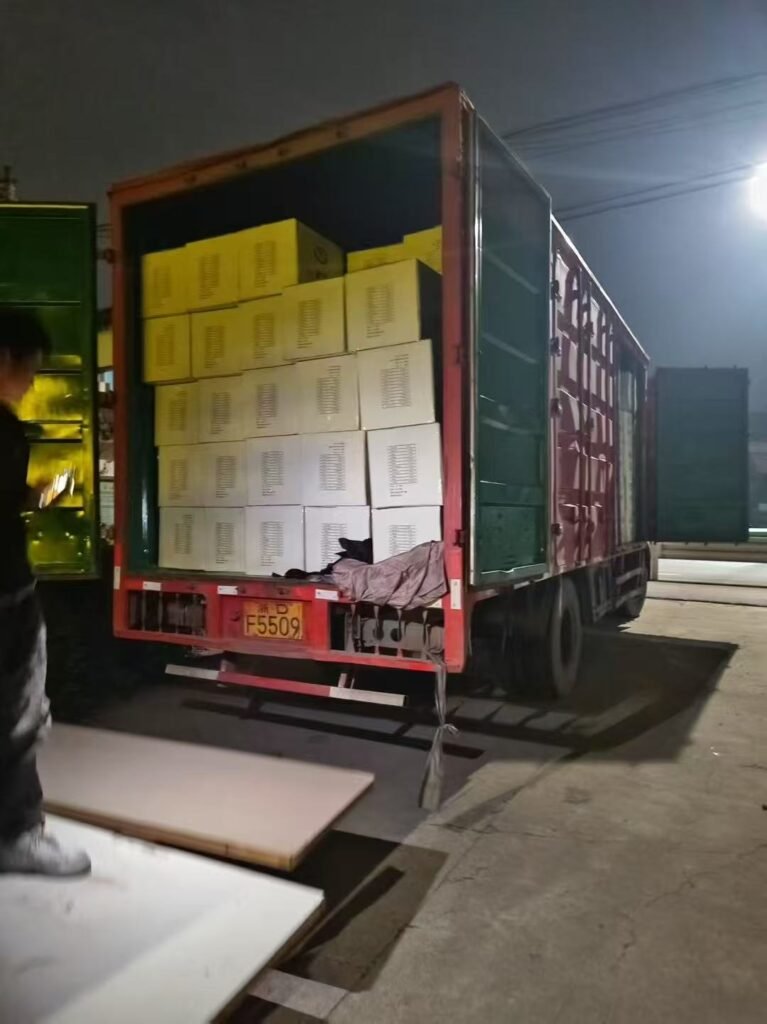 the last box of Muslim headscarves was steadily loaded onto the truck